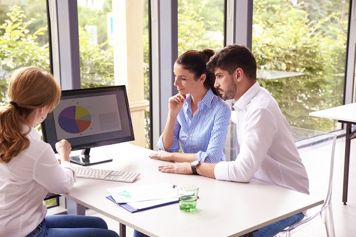 Investment Advisor Businesswoman Giving Savings Ideas To Young C Finance tips